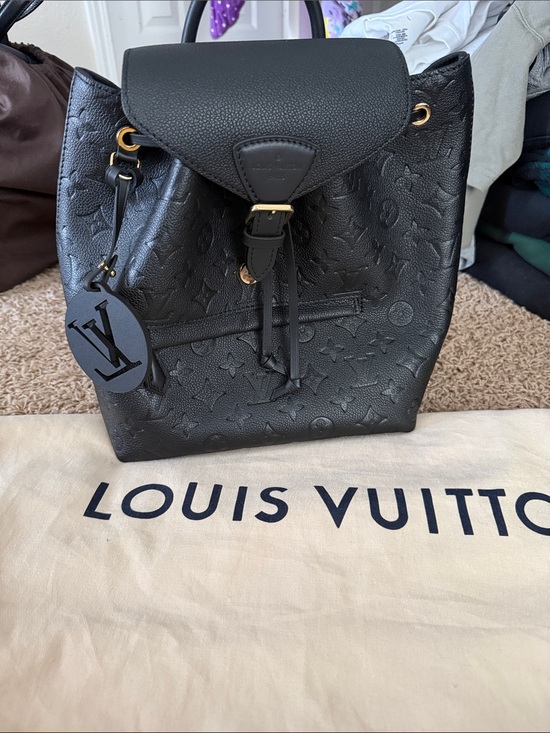 Louis Vuitton Handbags - Louis Vuitton Black Embossed Monogram Backpack with Gold Hardware BRAND NEW